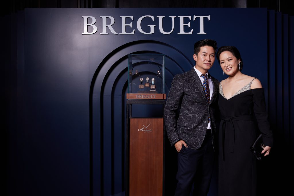 Puwanart Kunpalin and Alisa Phanthusak Kunpalin pose with Breguet backdrop