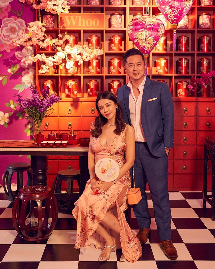 Guests pose with the History of Whoo backdrop at PINCNY2023 event